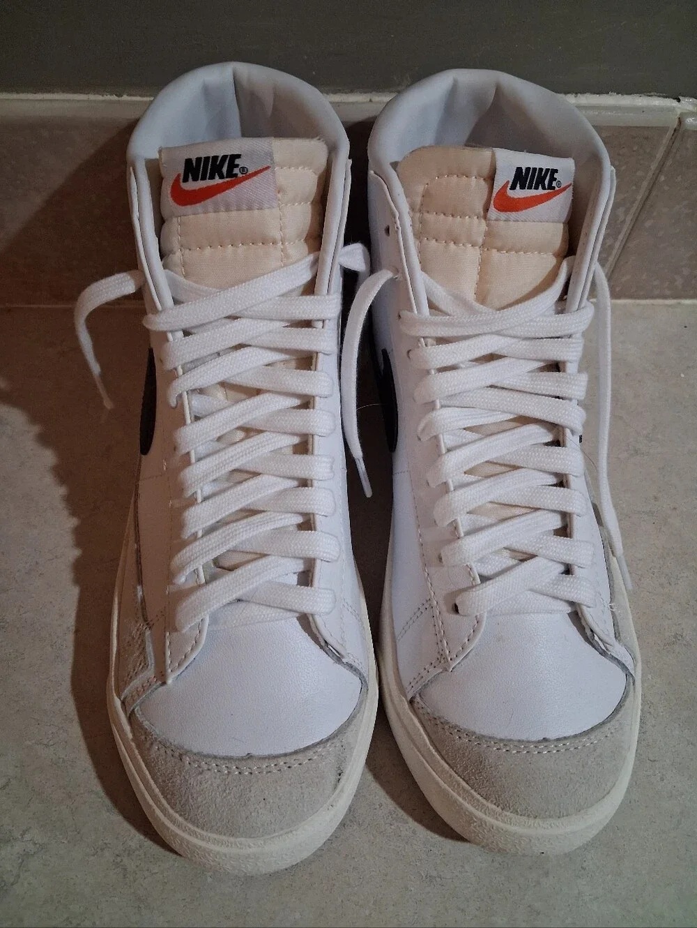 Nike Blazer Mid '77 vintage sneakers, bold black leather Swoosh